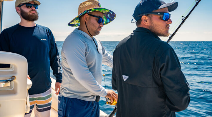 fishing guides looking at the water in belize