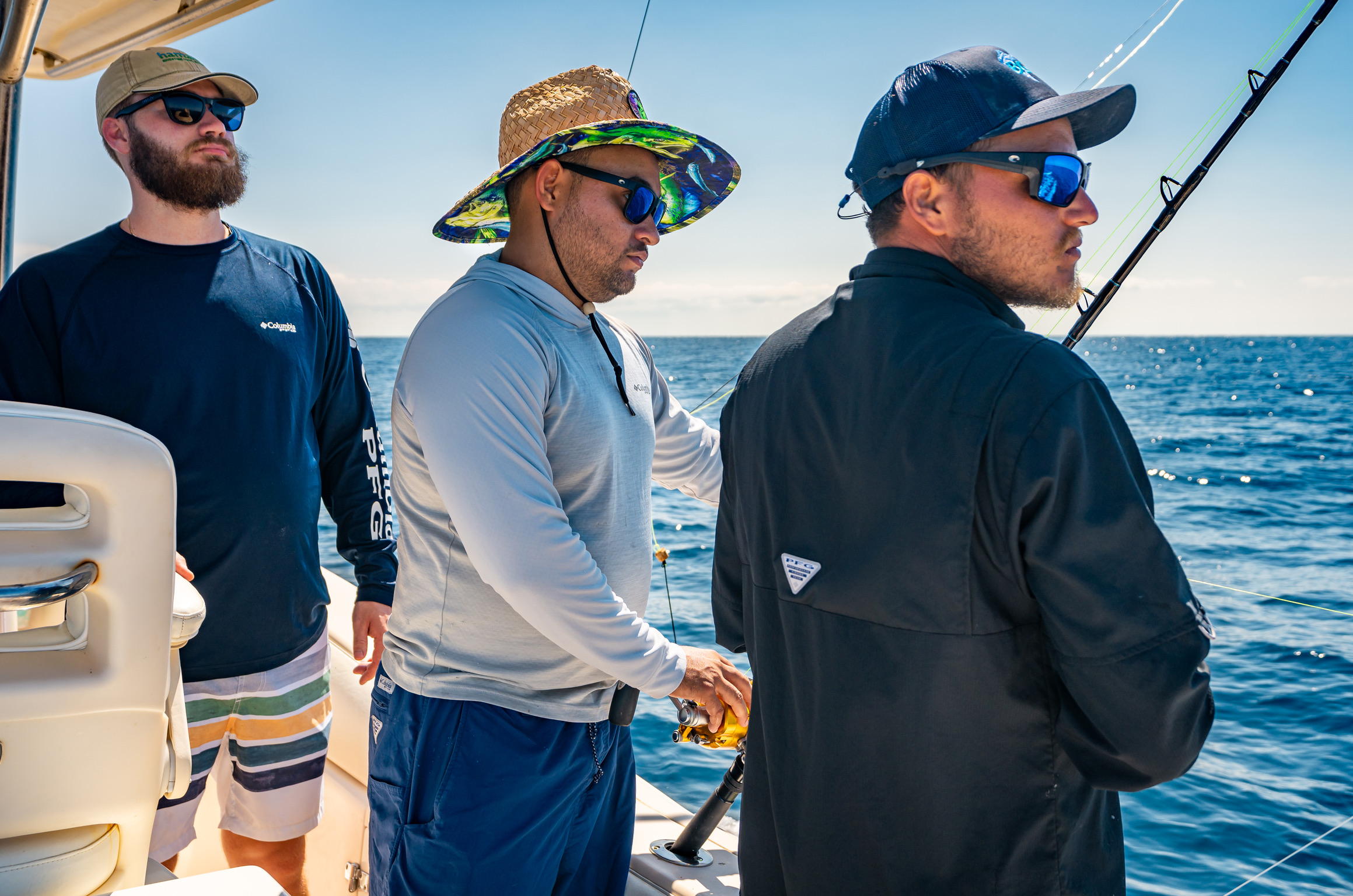 fishing guides looking at the water in belize