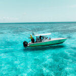 fishing boat on belize coral reef