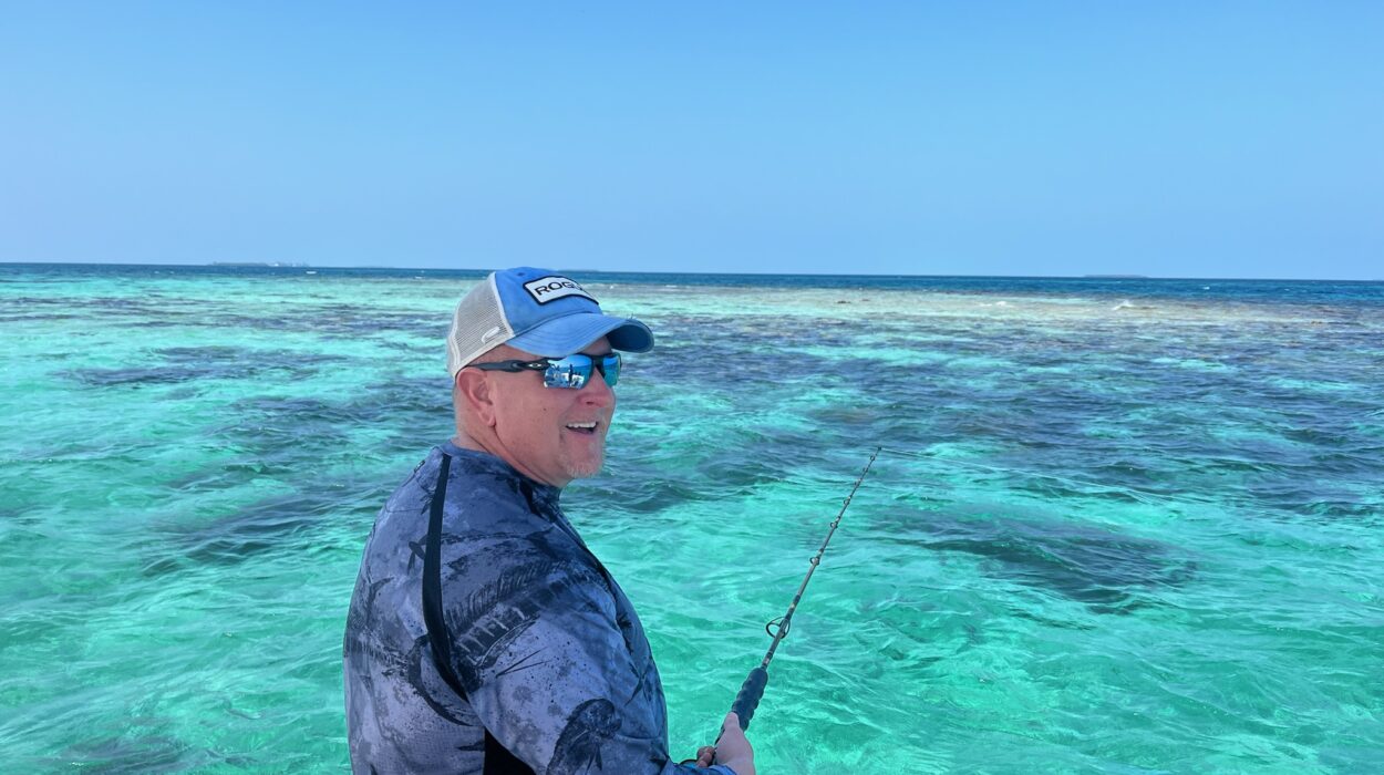 A guest fishing on the beautiful belize barrier reef